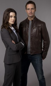 Josh Holloway as Gabriel Black and Meghan Ory as Riley Neal.