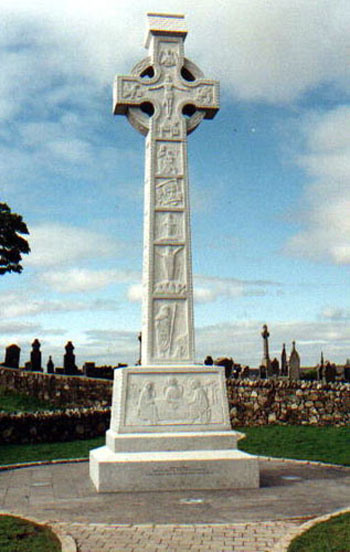 A Celtic cross that Kevin Ryan and two other stone-cutters carved years ago in County Wicklow, Ireland. It's made of granite and stands at a height of 26.5 ft. making it the tallest Celtic cross in Europe. It was commissioned in memory of the victims of the Omagh bombing. One of the images on the cross features a depiction of the last supper of the imprisoned Bobby Sands.