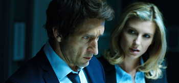 Detective Robbie Green (Jonathan LaPaglia) and Detective Jane Lambert (Viva Bianca) on the case in The Reckoning.