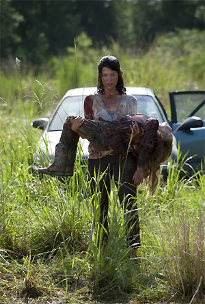 Audrey Marie Anderson and Meyrick Murphy in The Walking Dead.